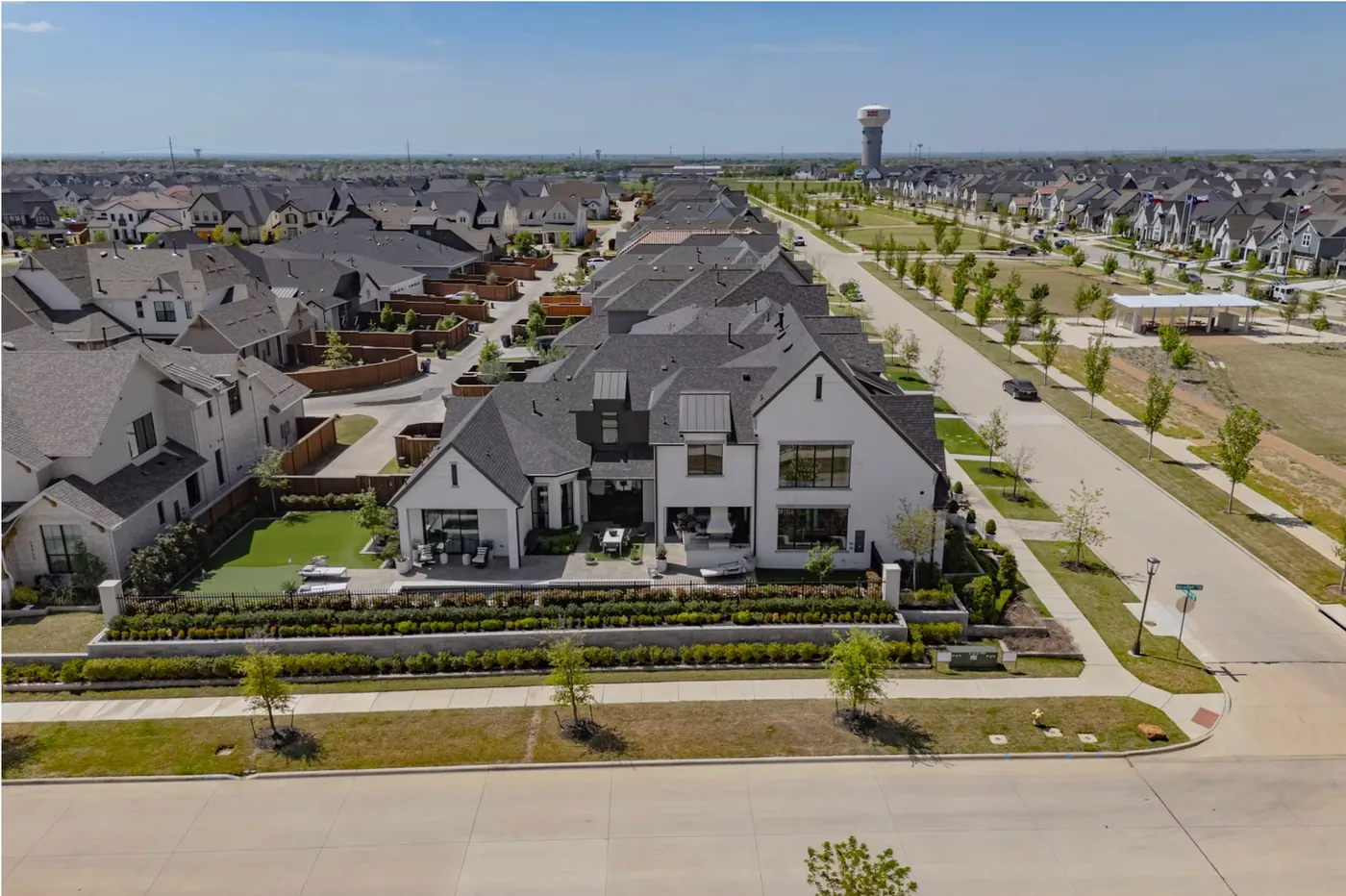 Aerial view of the property and neighborhood
