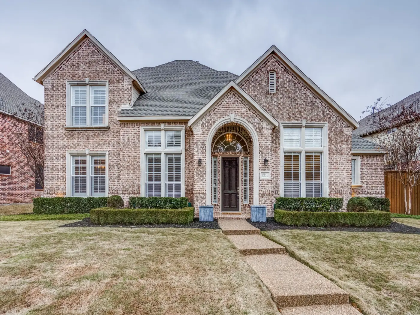 Golden-hour exterior of a DirectList home
